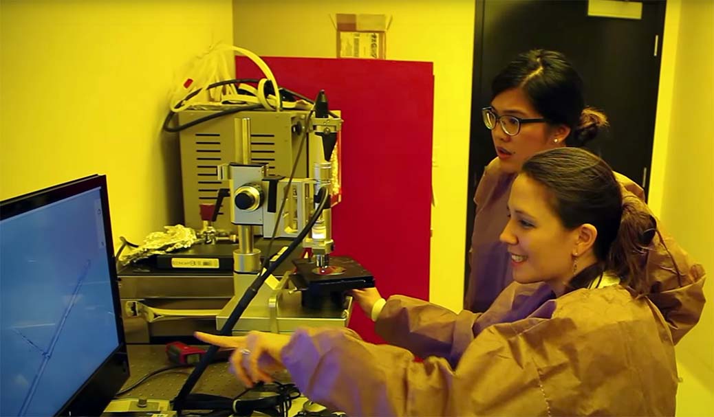 Two students researching neural implants