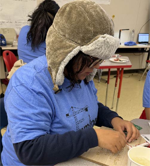 student working on project