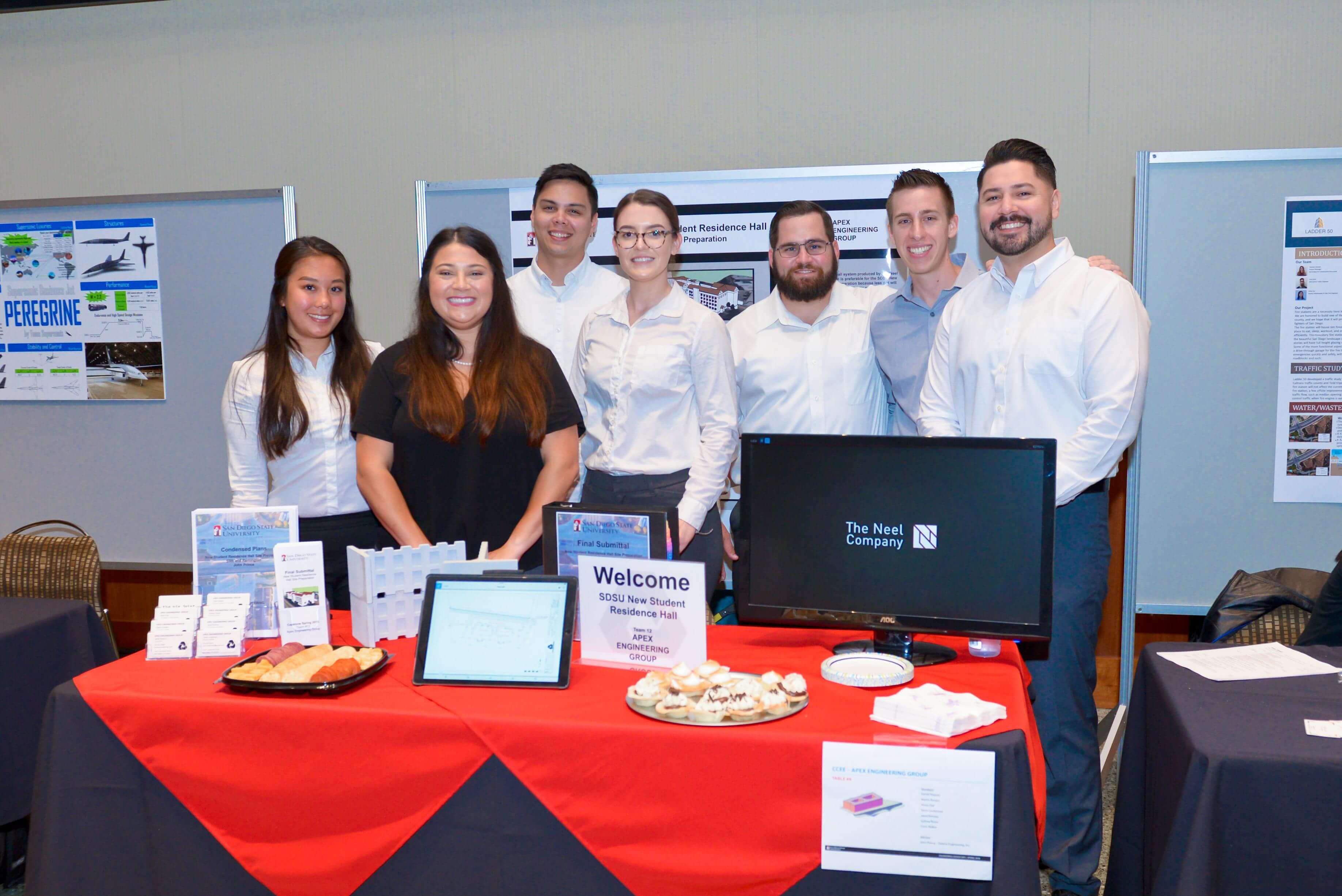 The Neel Company poses with their project