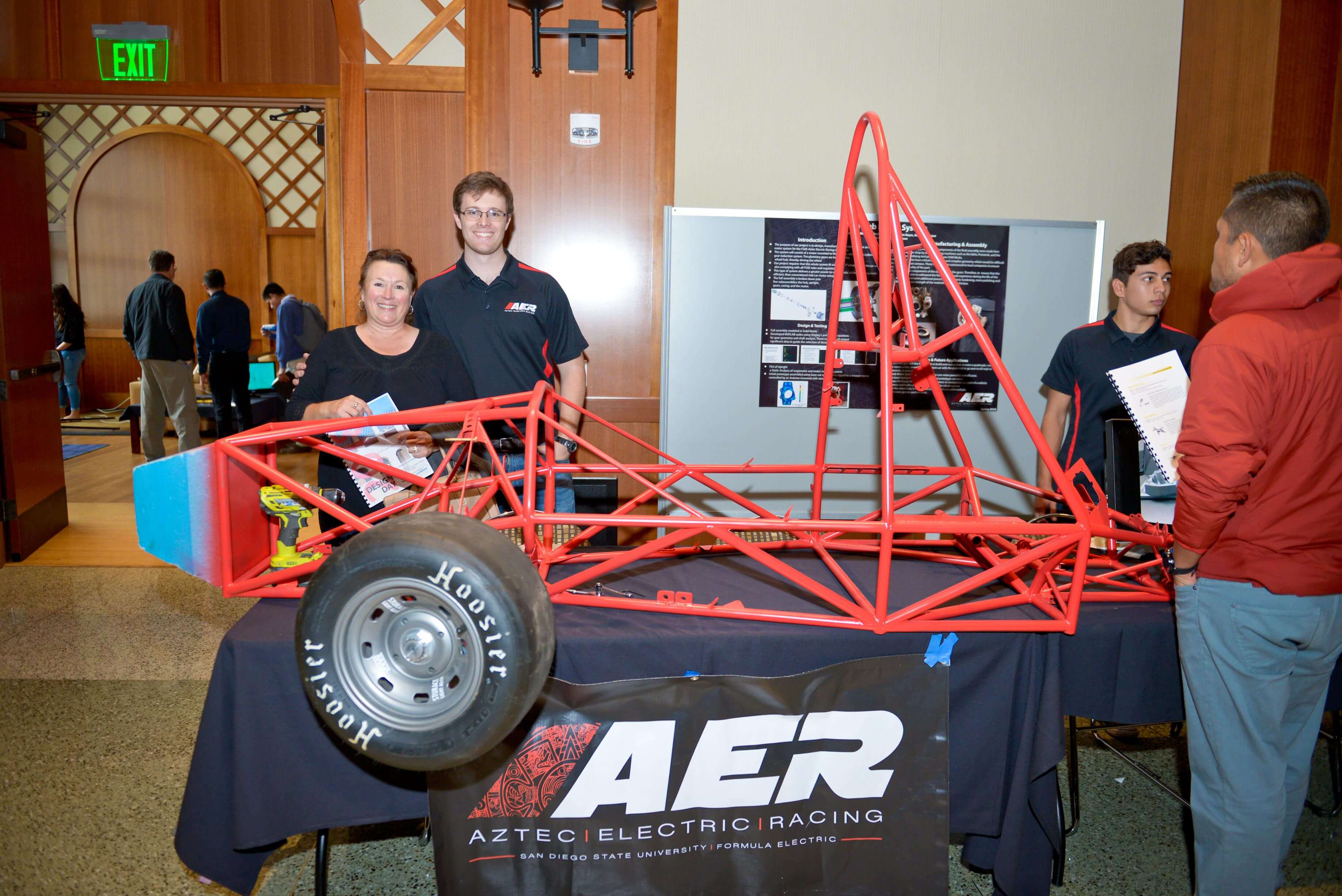 Students pose with their Formula Electric project