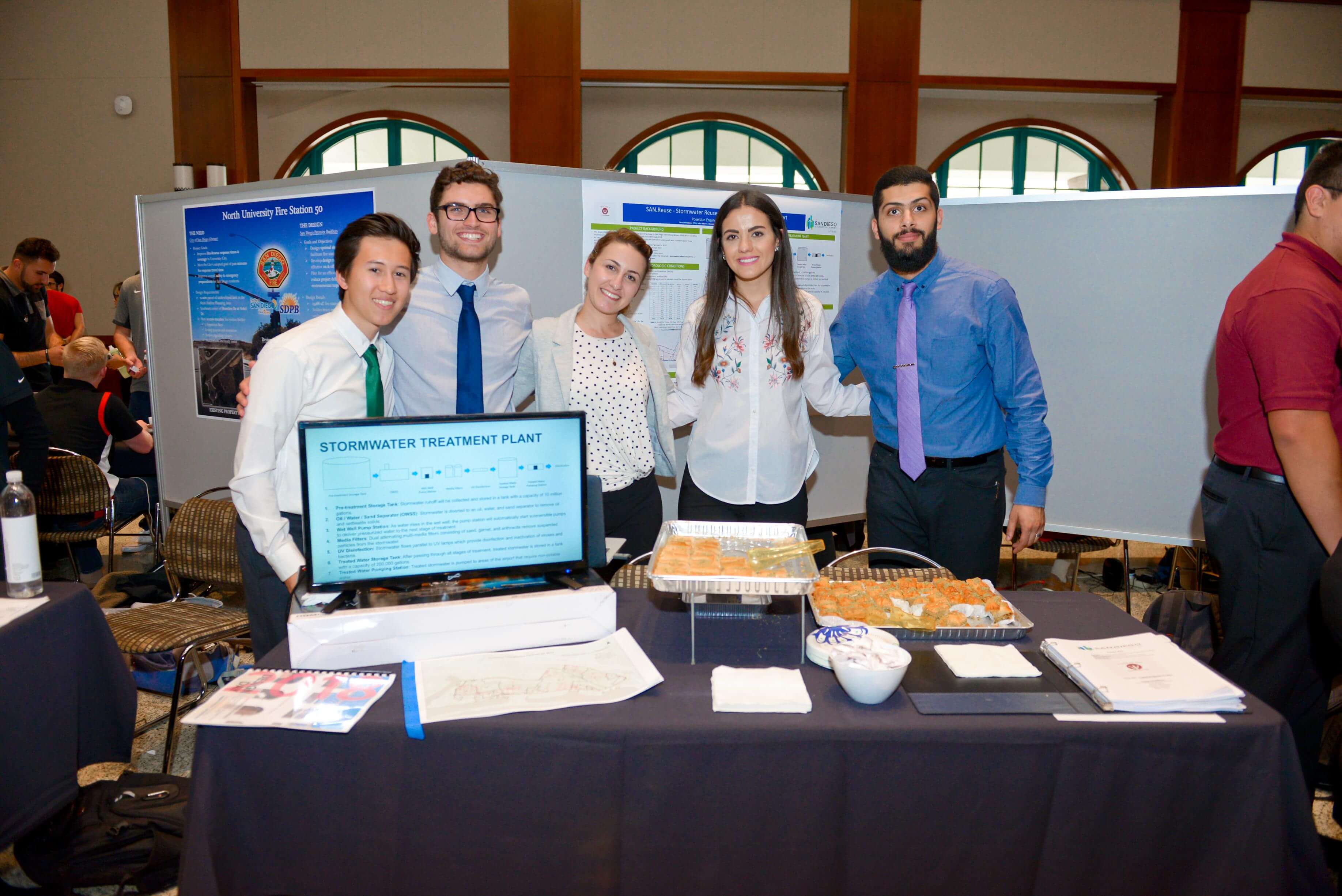 Students pose with their Stormwater Treatement Plan project