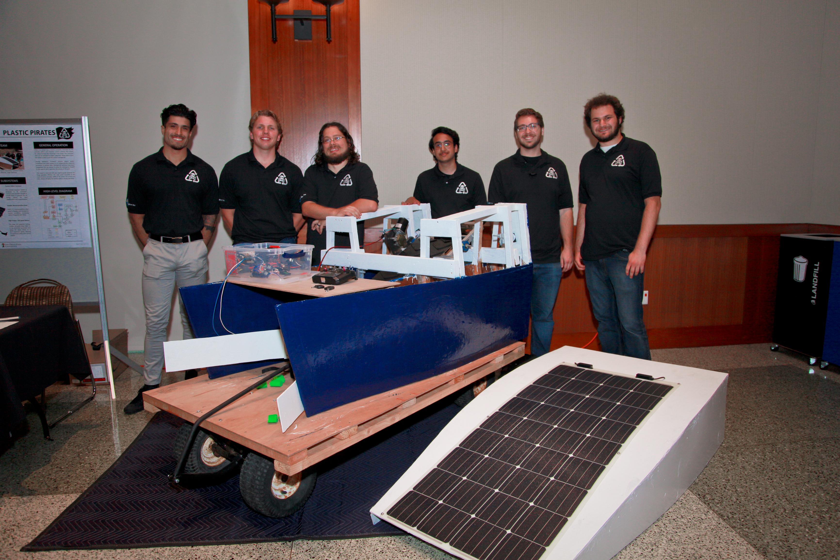 Team posing with their project