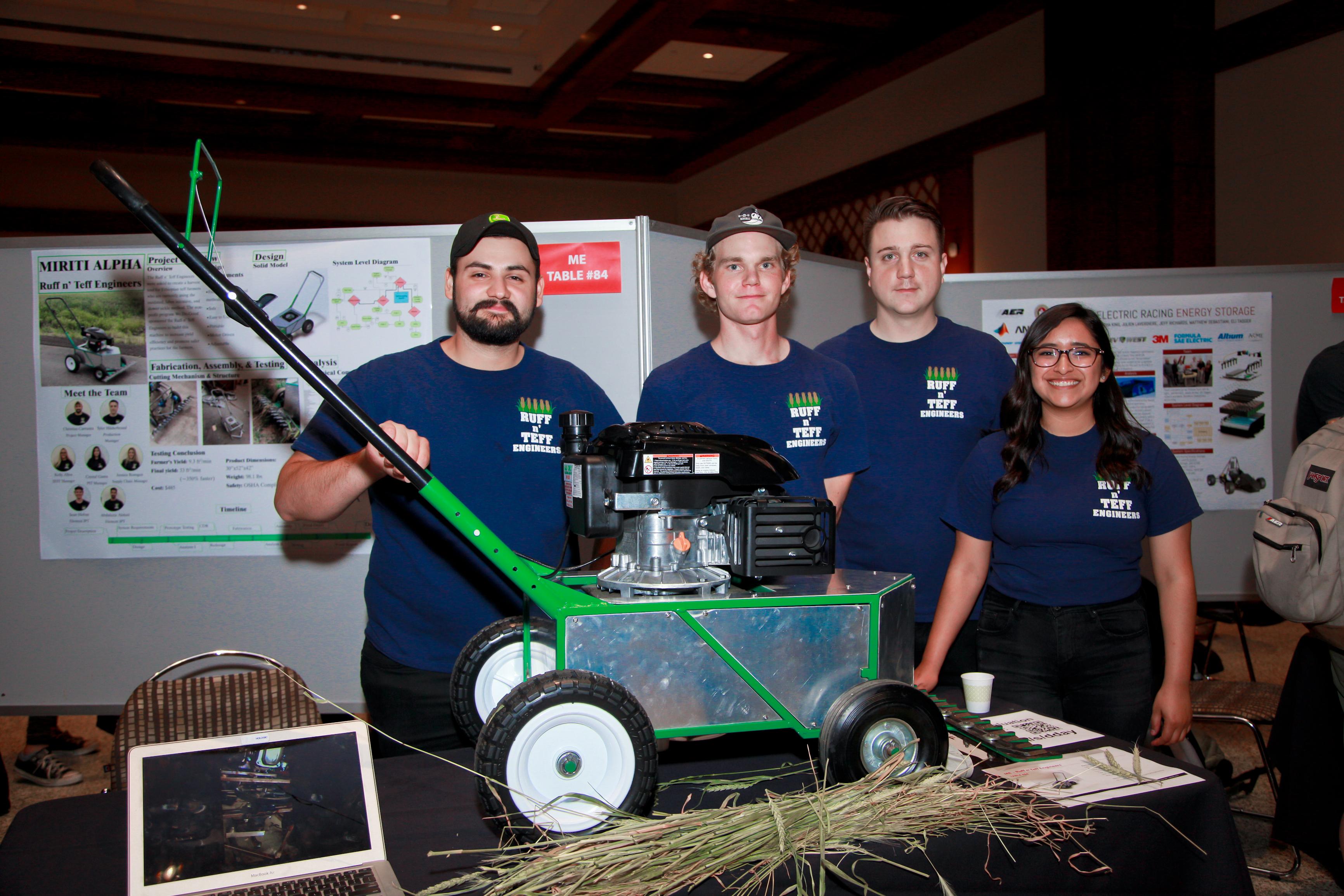 Team members and their prototype for a lawnmower