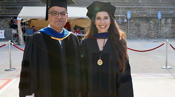 Paulina Díaz-Montiel (right) at May 2022 Commencement with her mentor, aerospace engineering professor Satchi Venkataraman. (Photo: Melinda Sevilla)