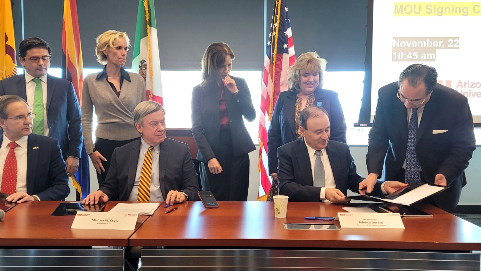 Octavio Martínez (far right) signs as honorary witness the MOU on semiconductor cooperation between the US and Mexico.  