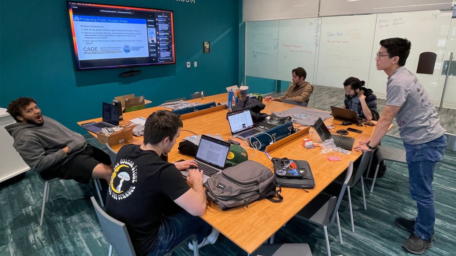 Team AzTechs work on their safe evacuation system submission in the William G. Tong Conference Room in the Engineering and Interdisciplinary Sciences (EIS) Building.