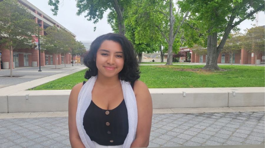 City College graduate Shalayah-Naomi Webb smiles in Curran Plaza on May 18, 2023. Photo by Shamere Grimes/City Times Media