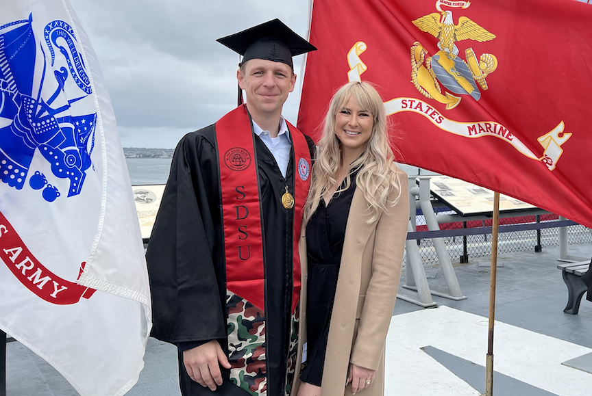 Christopher Phillips and his wife standing on the USS Midway during the 2024 San Diego State University Inaugural Veteran Commencement Ceremony (Photo taken by: Denise Graham)