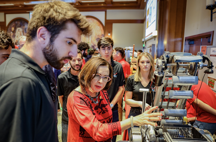 SDSU President Adela de la Torre (center) viewed College of Engineering Senior Design Day projects in Montezuma Hall in 2023. (Photo: Rachel Crawford)